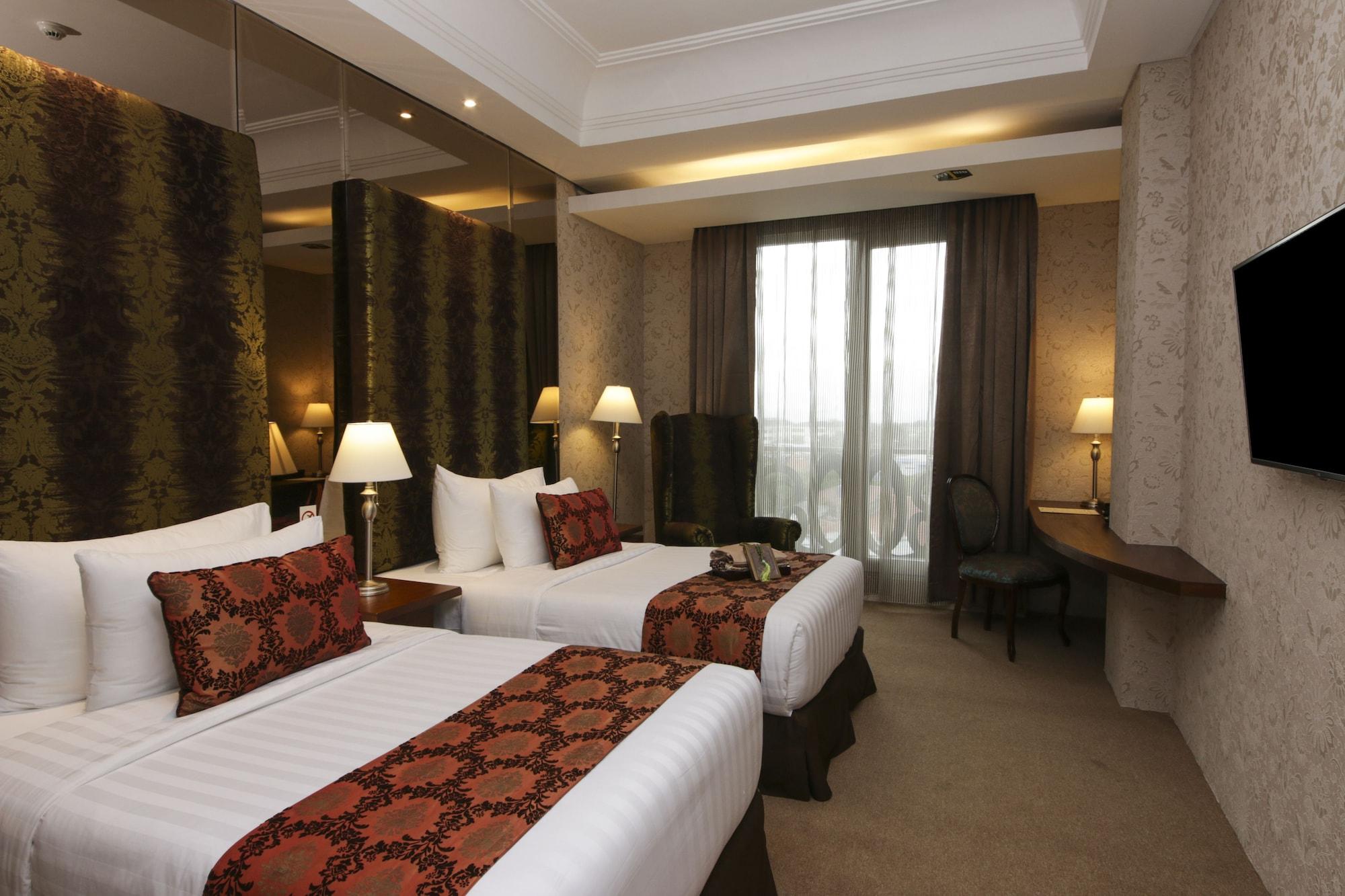 Cinnamon Hotel Boutique Syariah Tutugan Exterior photo